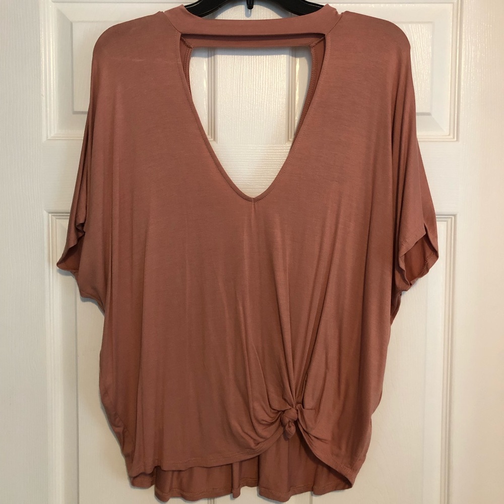 Tie-up front. Deep neck shirt.